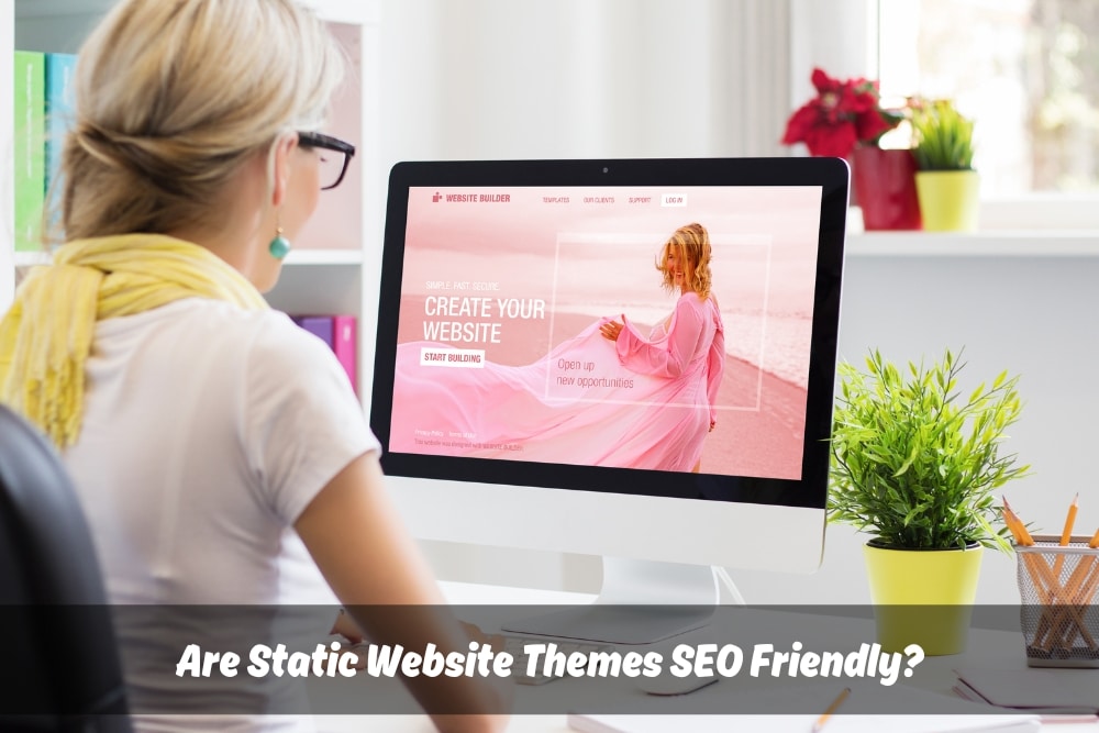 A woman wearing glasses designs a website on a computer screen. The website theme is pink and features a woman in a pink dress. Text on the screen reads "Create your website." This image accompanies a blog post exploring the SEO friendliness of static website themes.